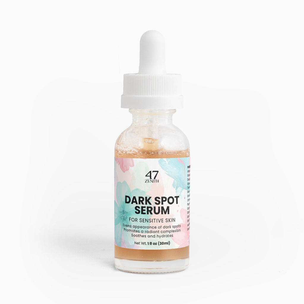 Bottle of dark spot serum with a colorful label on a white background