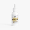 Vitamin Glow serum bottle with dropper on a white background