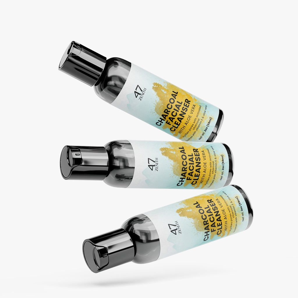 Three bottles of 4711 Charcoal Facial Cleanser on a white background