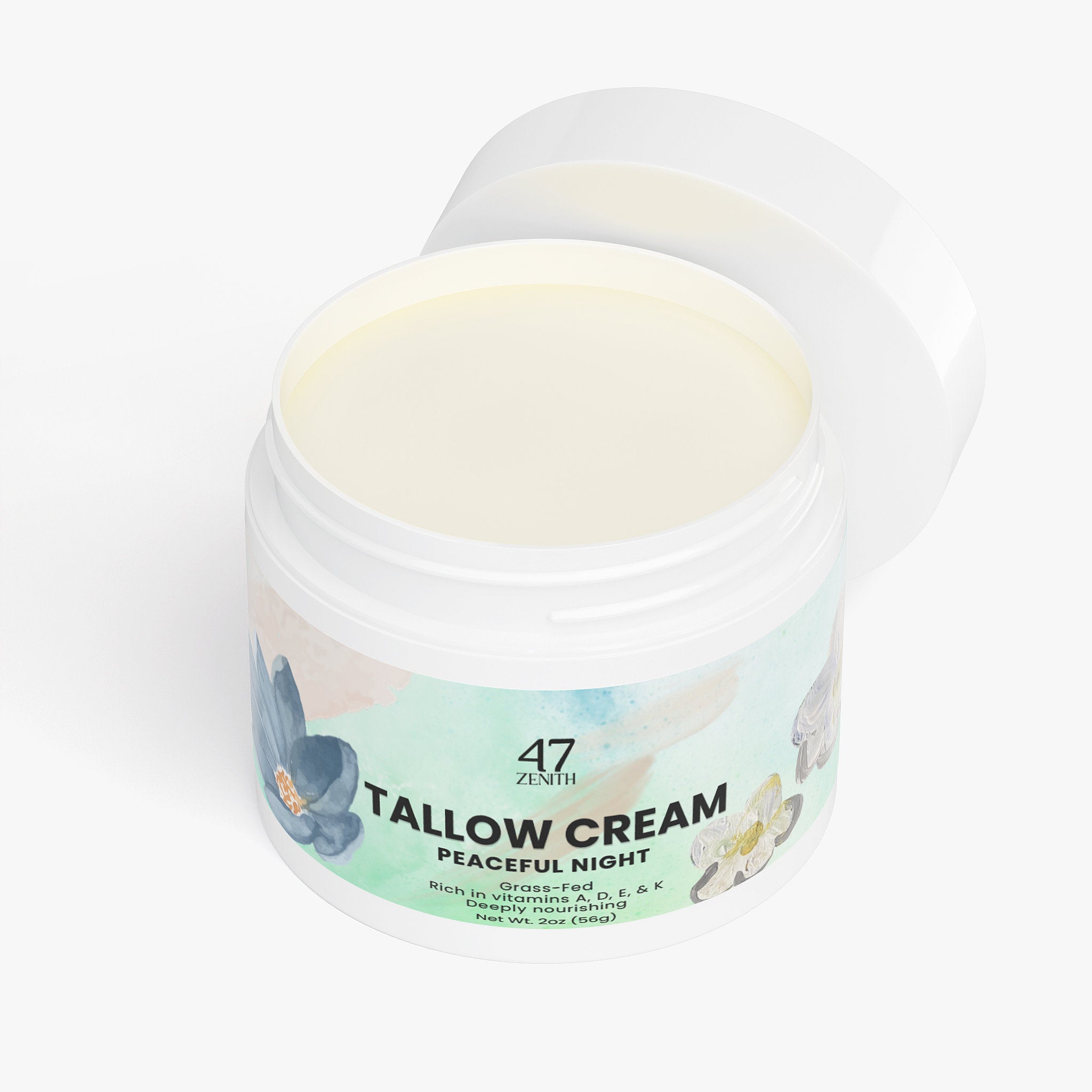 Jar of tallow cream with a label on a white background